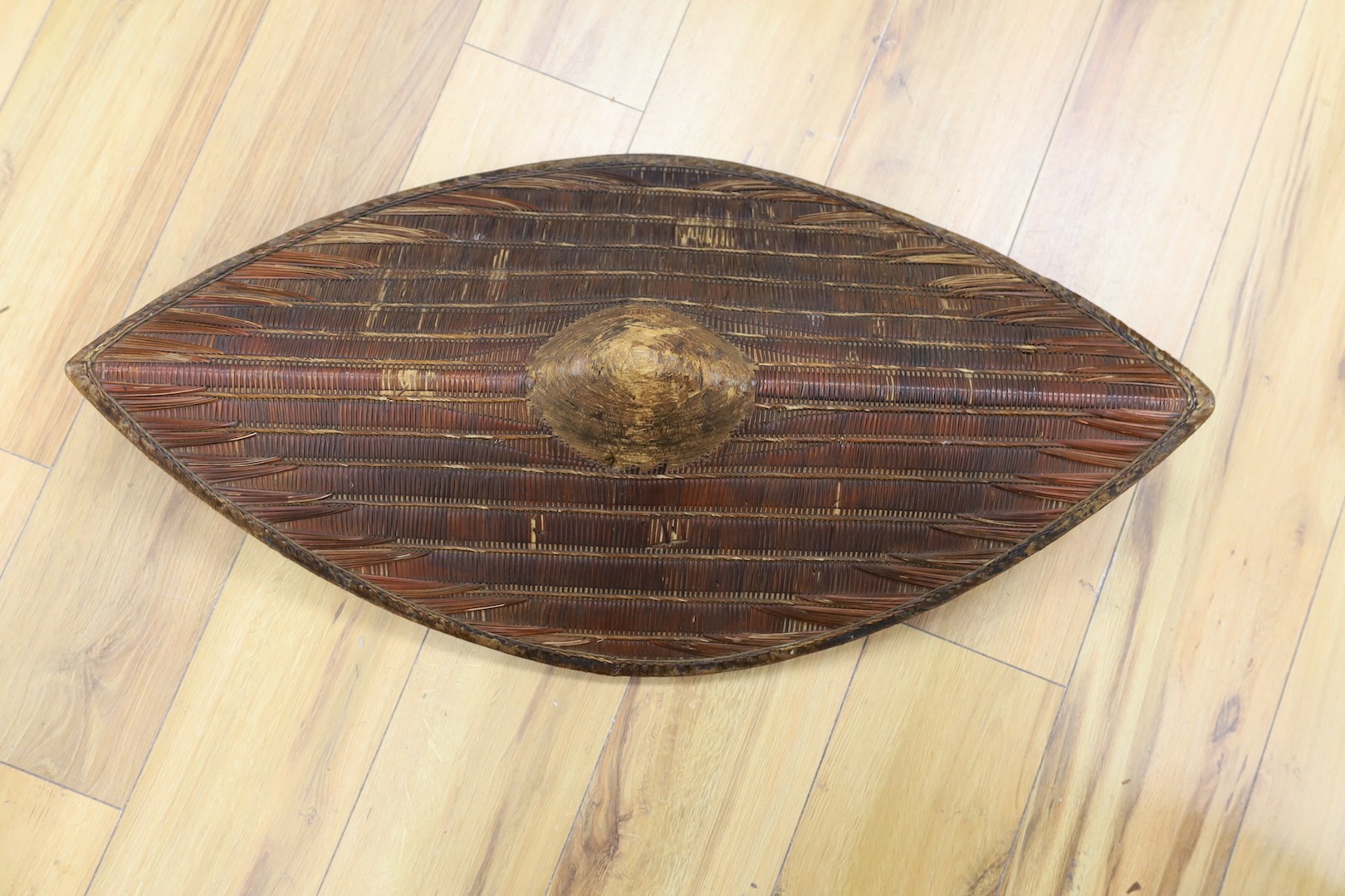 A Ugandan wicker shield, Soga or Ganda, 83cm